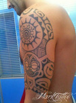 mark-tattoo-torrejon-ardoz-tatuaje-polinesio-brazo-sol-cara