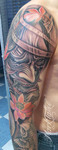 mark-tattoo-torrejon-ardoz-tatuaje-oriental-brazo-manga-buddha-flores-hannya