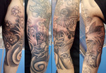 mark-tattoo-torrejon-ardoz-tatuaje-oriental-brazo-carpa-koi-espiral-flores