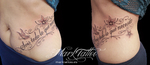 mark-tattoo-torrejon-ardoz-tatuaje-letras-cintura-frase-mariposa