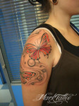 mark-tattoo-torrejon-ardoz-tatuaje-hombro-mariposas-burbujas