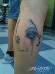 mark-tattoo-torrejon-ardoz-tatuaje-pierna-ojos-azul